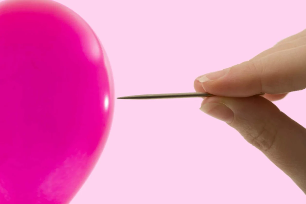 Bursting balloon toxic positivity concept